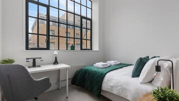 2 Schlafzimmer, BĂŒgeleisen/BĂŒgelbrett, kostenloses WLAN, BettwĂ€sche