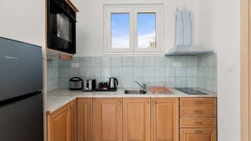 Grand réfrigérateur, plaque de cuisson