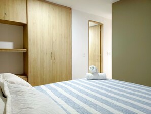 Apartamento família, 2 quartos, vista para a piscina | 2 quartos, Wi-Fi de cortesia, roupa de cama