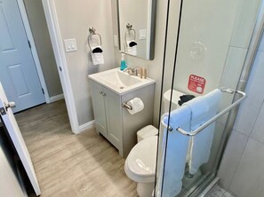 Shower, towels, soap, shampoo