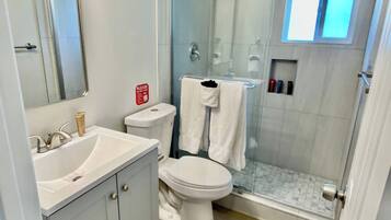 Shower, towels, soap, shampoo