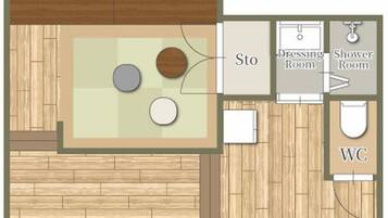 A hotel room layout with a living area, a dressing room, a shower room, and a WC.