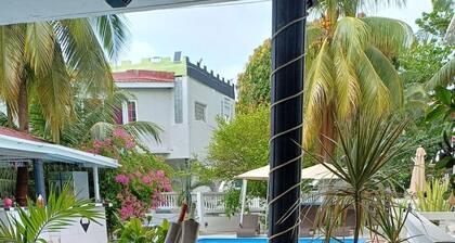 Aparthotel 5-minutes away from beach w/ AC, Wi-Fi, & pool view in RodneyBay