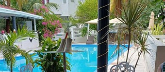 Aparthotel 5-minutes away from beach w/ AC, Wi-Fi, & pool view in RodneyBay