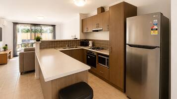 Deluxe House, Multiple Beds, Non Smoking | Private kitchen | Full-size fridge, microwave, oven, stovetop
