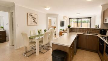 Deluxe House, Multiple Beds, Non Smoking | Private kitchen | Full-size fridge, microwave, oven, stovetop