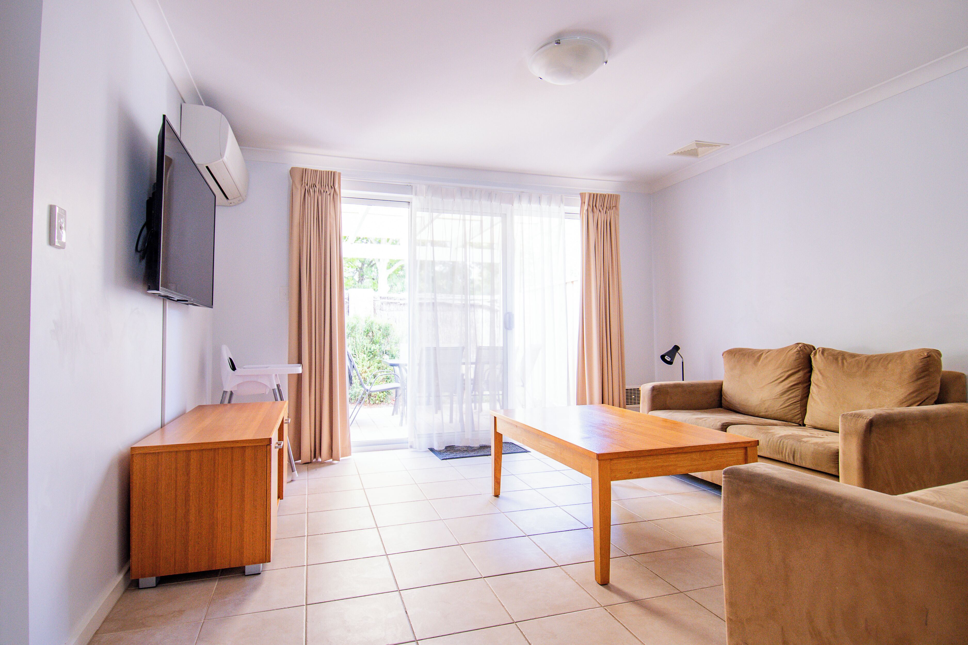 Deluxe House, Multiple Beds, Non Smoking | Living area | 55-inch TV with digital channels