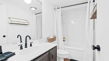 Hair dryer, towels, soap, shampoo