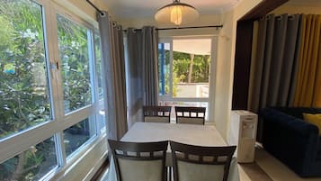 Deluxe Apartment, Balcony, City View | Living area | 24-inch Smart TV with digital channels