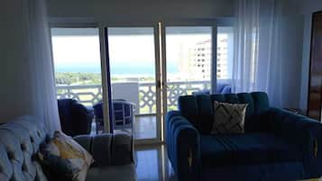 Classic Apartment, Balcony, City View | Living area | 24-inch Smart TV with digital channels