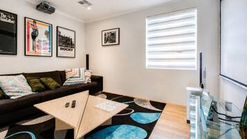Deluxe House, Multiple Beds, Non Smoking | Living area | 55-inch TV with digital channels, Netflix, streaming services