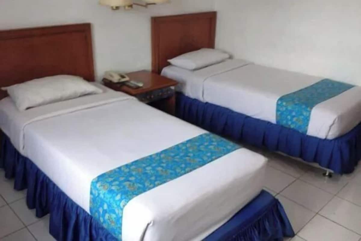 Desk, free WiFi, bed sheets