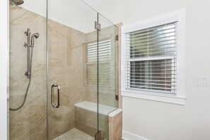 Shower, hair dryer, towels, shampoo