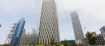 Xiaisi Lexiang Service Apartment (Dalian Xinghai Square)