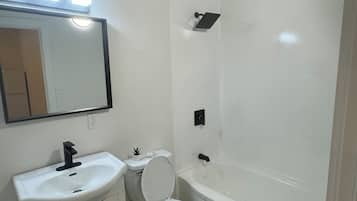 Hair dryer, towels, soap, toilet paper