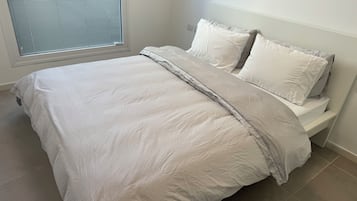 4 bedrooms, laptop workspace, soundproofing, iron/ironing board