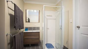 Shower, towels, soap, shampoo