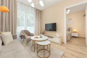 Apartamento, 1 quarto, sacada | Sala de estar