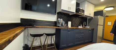 Fridge, microwave, coffee/tea maker, electric kettle