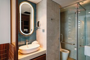 Deluxe Double Room Single Use, Balcony, City View | Bathroom | Hair dryer, slippers, towels, soap - Ocean Sense Hotel (Hai Phong)