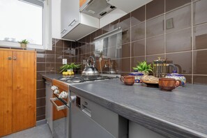 Appartamento, 1 camera da letto, balcone | Cucina privata | Microonde, tavolo da pranzo