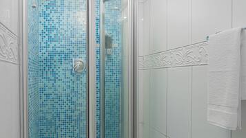Shower, towels, soap, shampoo