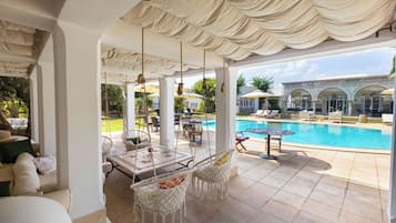 2 outdoor pools, pool umbrellas, sun loungers