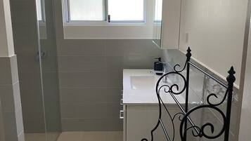 Shower, towels, toilet paper