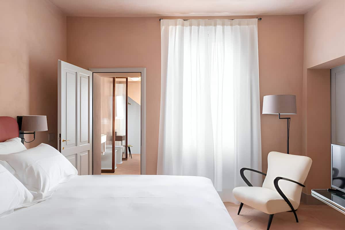 Premium bedding, down duvets, memory-foam beds, desk