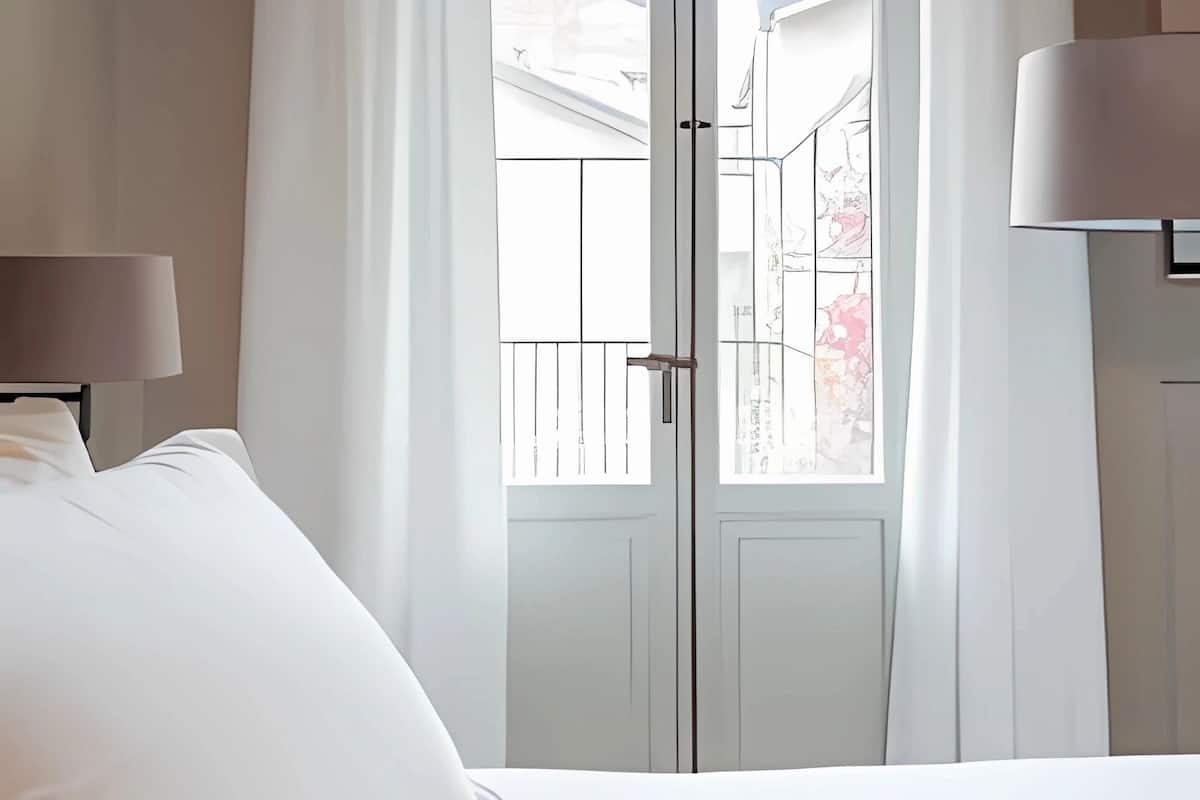 Premium bedding, down duvets, memory-foam beds, desk
