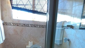 Double Room | Bathroom | Shower, towels, soap, toilet paper