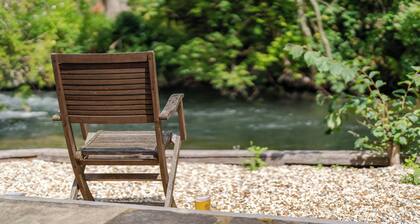 Relaxing Riverfront Cottage with
Private Terrace