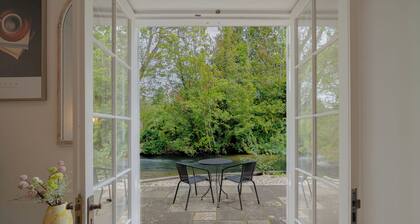 Relaxing Riverfront Cottage with
Private Terrace