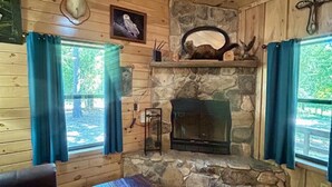 TV, fireplace - Lost In The Woods Cabin | Hochatown Cabin with Hot Tub, Fire Pit, Grill & Pets (Hochatown)