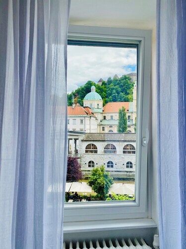 Room with a view of Ljubljana Castle located in the heart of the city.