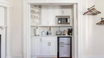 Fridge, microwave, coffee/tea maker, toaster