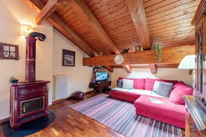 Luxury Apartment, 1 Bedroom (La Casa di Camus) | Living room | 21-inch flat-screen TV with digital channels, TV, video-game console