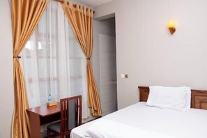 In-room safe, desk, laptop workspace, iron/ironing board - Simba Villa (Arusha)