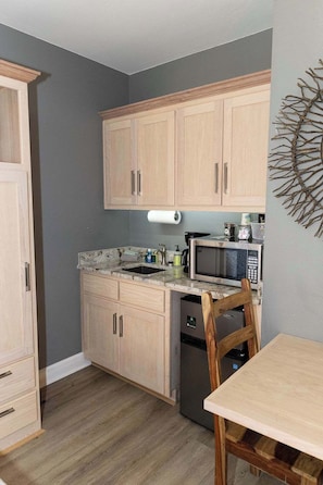 Fridge, microwave, coffee/tea maker, toaster