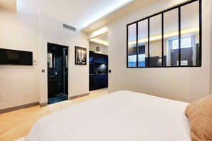 1 slaapkamer, een strijkplank/strijkijzer, wifi, beddengoed