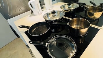 Standard Apartment, City View | Private kitchenette | Electric kettle, dining tables