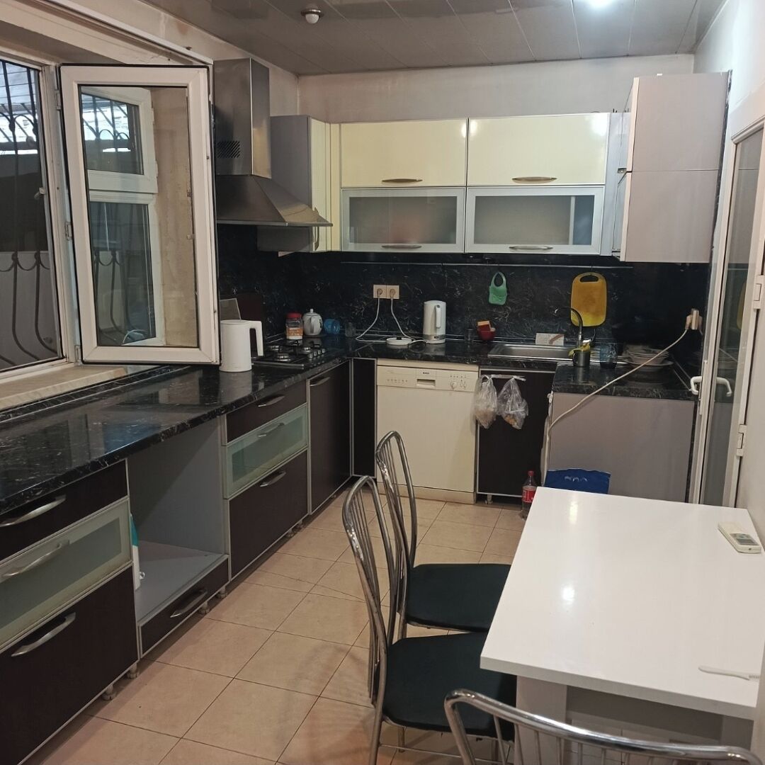 Basic Condo | Shared kitchen facilities | Full-size fridge, paper towels