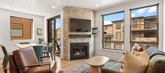 Central Location, Private Balcony and Mountain Views, Cozy Gas Fireplace