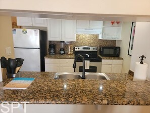 Condo, 1 Bedroom | Private kitchen | Fridge, oven, coffee/tea maker, toaster