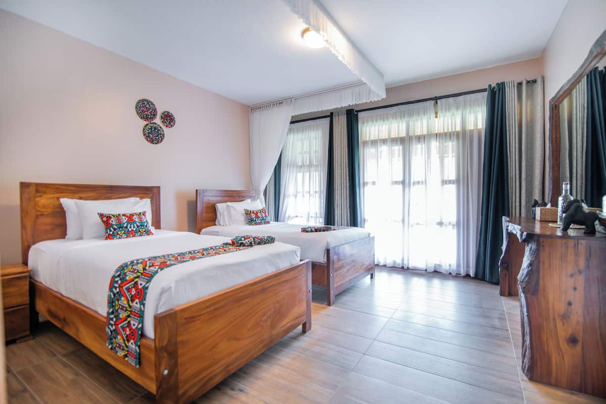Habitación Deluxe con 1 cama doble o 2 individuales | 2 dormitorios, minibar (con algunos artículos gratuitos), caja fuerte