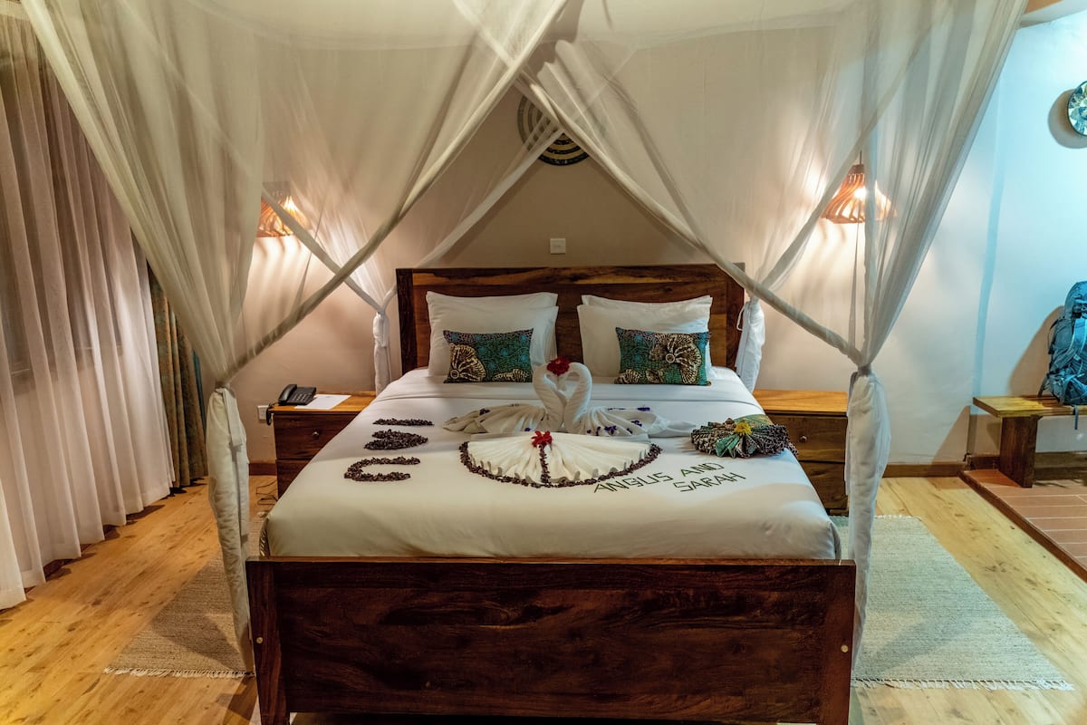 Habitación de luna de miel con 1 cama doble o 2 individuales | 2 dormitorios, minibar (con algunos artículos gratuitos), caja fuerte