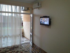 1 habitación, tabla de planchar con plancha, wifi y ropa de cama 