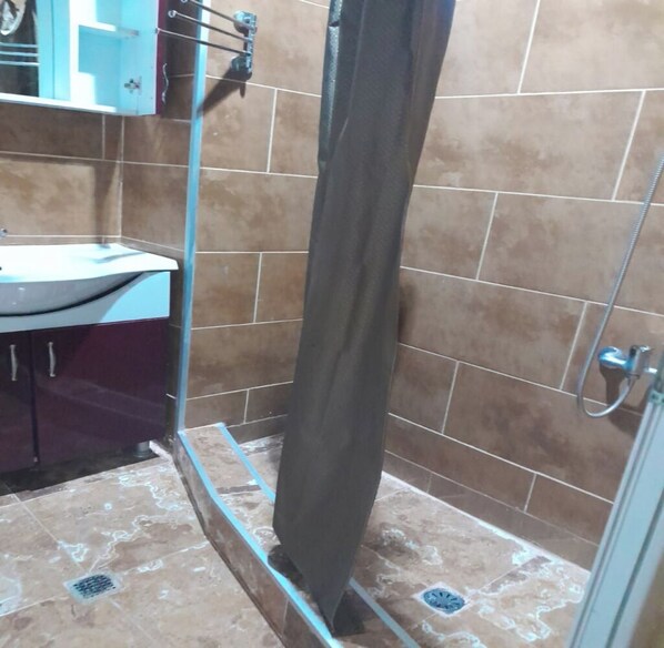 Shower, towels, soap, shampoo