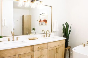 Eco-friendly toiletries, hair dryer, towels