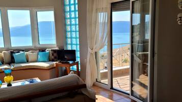 Superior Apartment, Lake View | 1 bedroom, hypo-allergenic bedding, down comforters, in-room safe